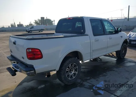 2002 Ford F-150 Lariat/Xlt z USA, uszkodzony, nr VIN 1FTRW08L82KD28620